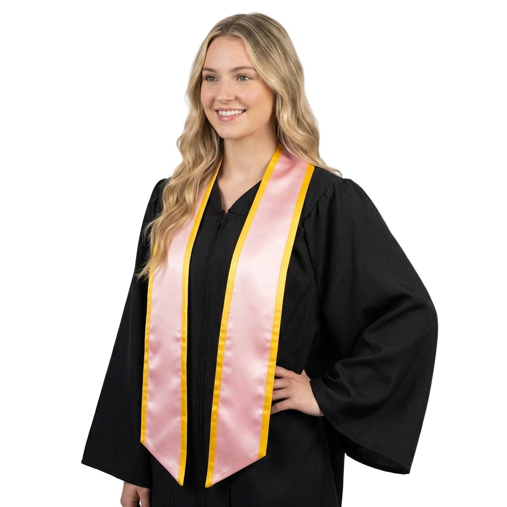 Pink slanted graduation stole with gold trim and angled ends, shown flat against a white background.